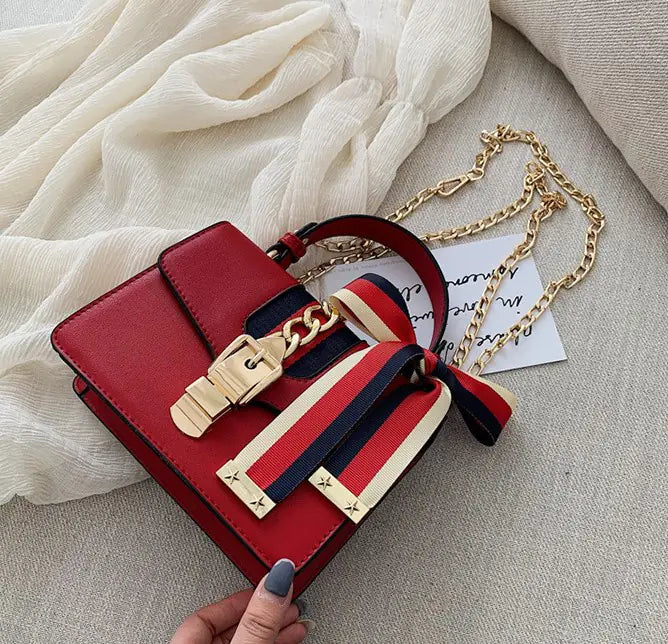 Color-Block Mini Handbag with Chain and Lock Closure